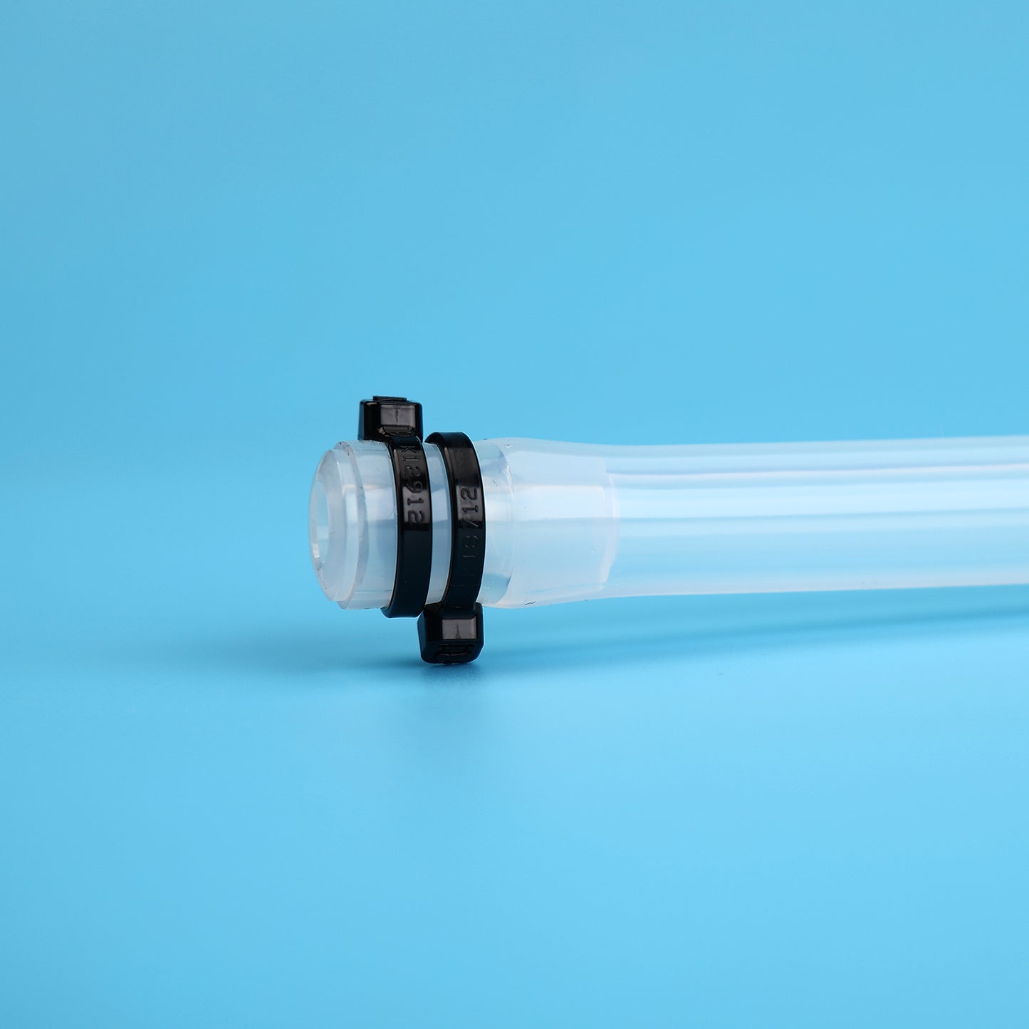 Single-Use Extension Transfer Sets with Thermoplastic Elastomer Tubing and Tubing Plugs