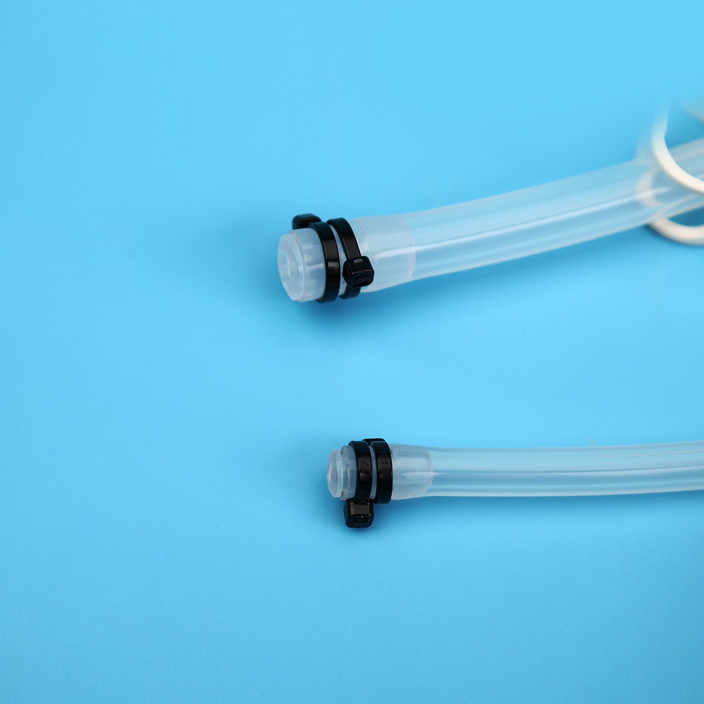 Single-Use Reduction Transfer Sets with Thermoplastic Elastomer Tubings and Tubing Plugs