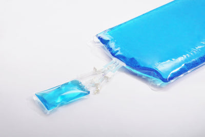 a single-use bag and a sampling bag, connected by tubings